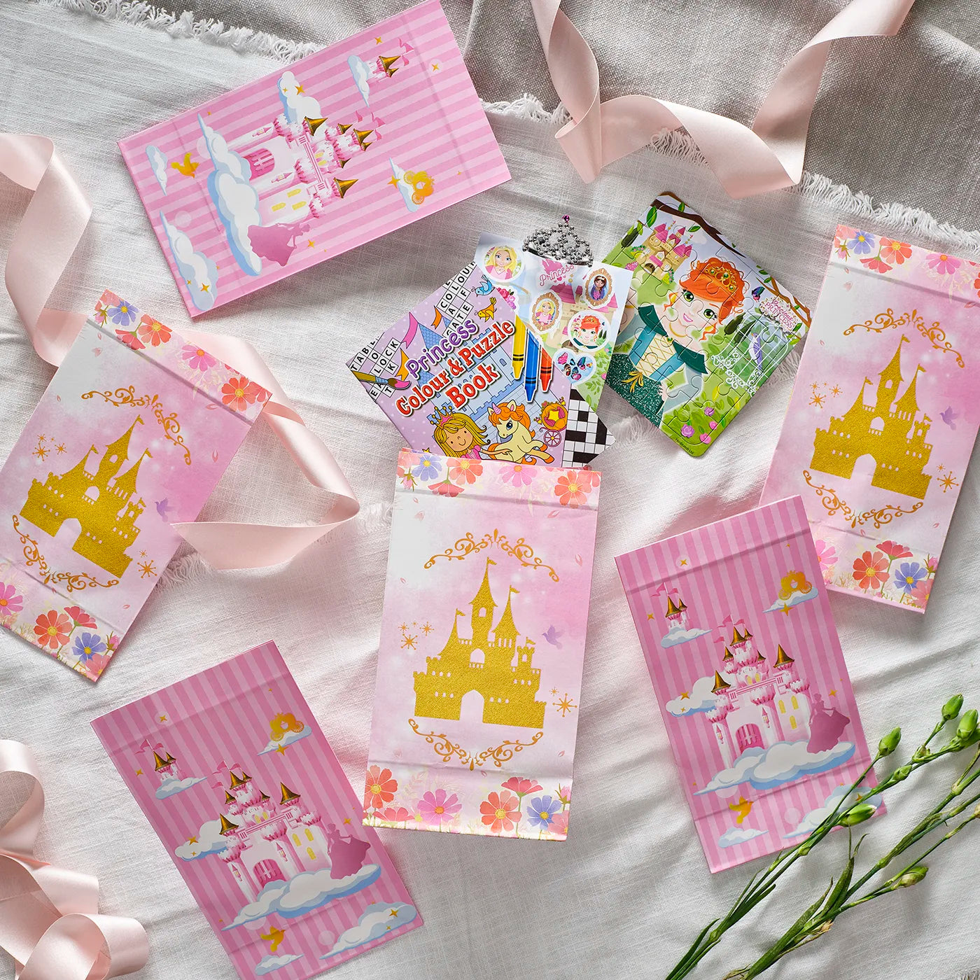 Kids Birthday Paper Party Bags with a Princess Theme. Includes stickers, colour and puzzle book and other children’s Party Gifts inside.